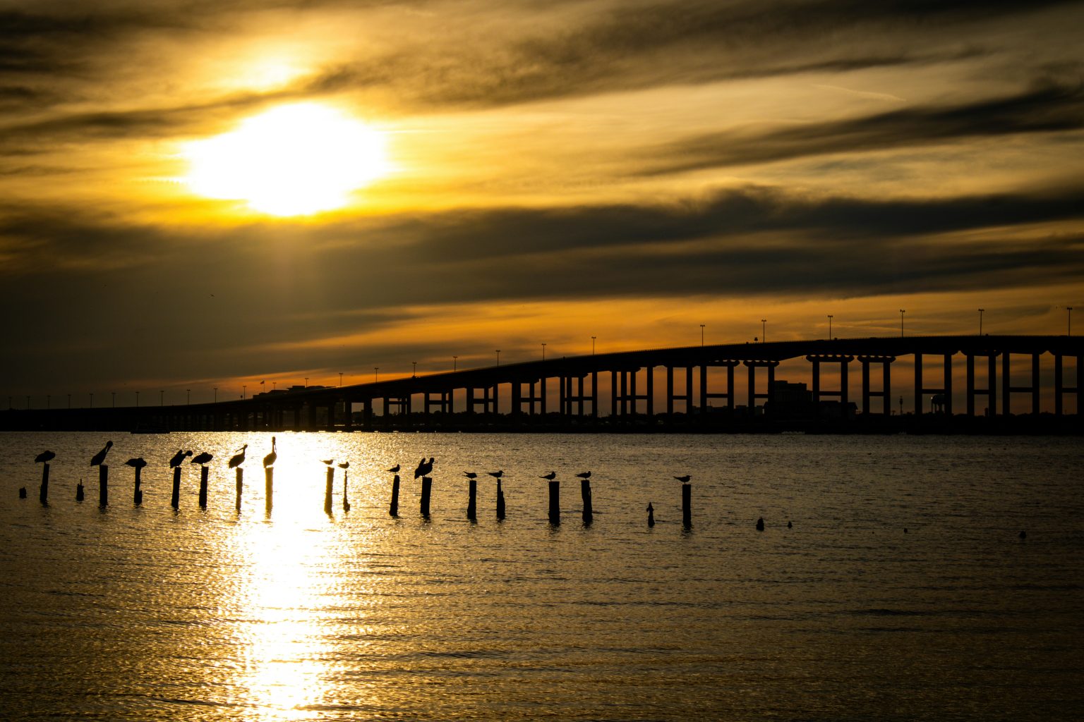 Covington bridge at sunset over the Louisiana Sound